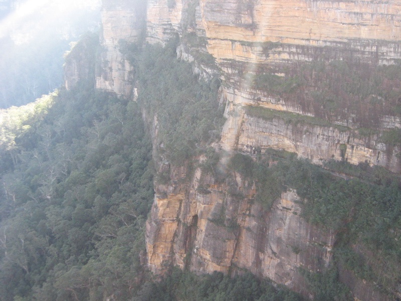 View of the National Pass track between the two layers of sandstone cliffs, taken from the stairs next to Wentworth Falls